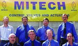 Mitech's management team: centre front, Greg Walker (Managing Director) (left) and Mike Sessions (Chairman) (right)